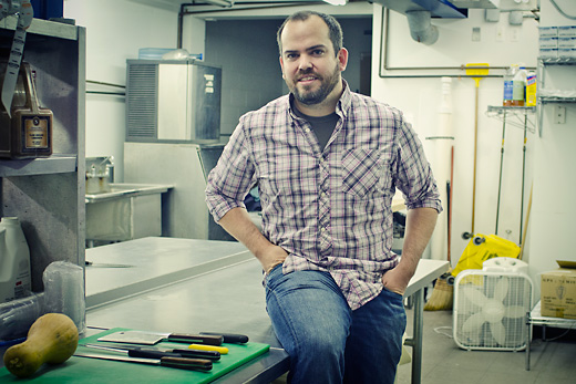 Brad Greenhill in the kitchen he shares with Jerusalem Garden