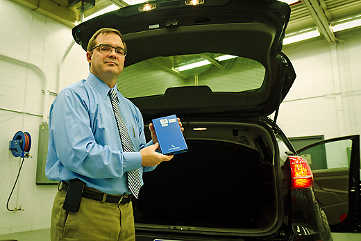 Jim Sayer with a transmitter at UMTRI