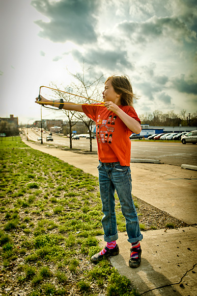 Mark Maynard's daughter Clementine shooting a seed bomb on to the Water Street site