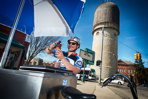 Rob Hess serving up Go! Ice Cream from his 1946 Worksman tricycle