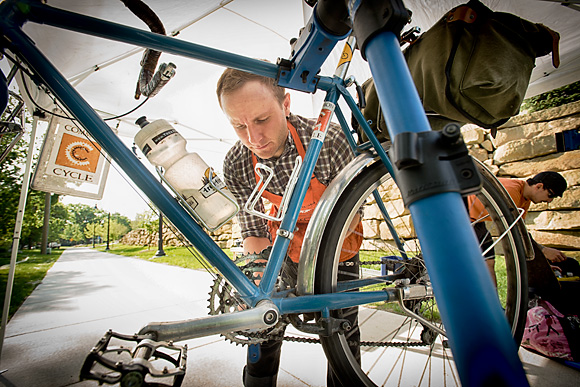 Ben Schultz fixing a bike at Common Cycle