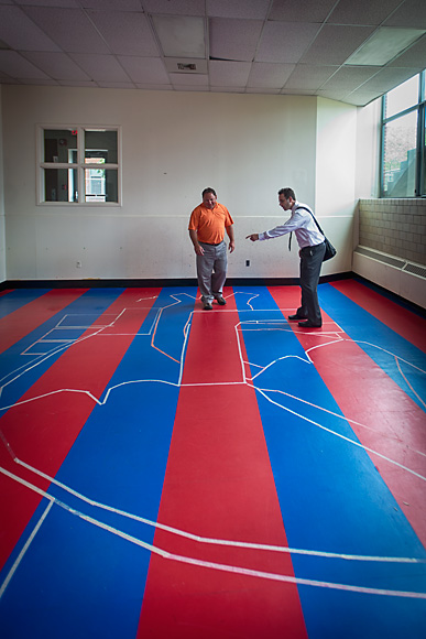 L to R Bob Densic and Jay Peterson with a mockup of the heart inside Rackham Hall