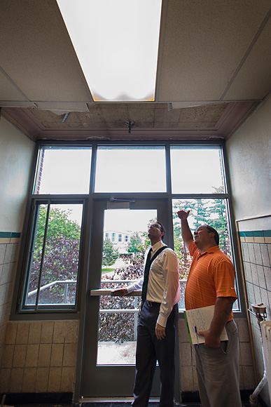 L to R Jay Peterson and Bob Densic check out 4 layers of ceilings at Rackham Hall