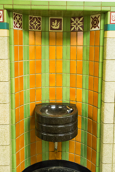 An original fountain with Franklin Tiles at Rackham Hall