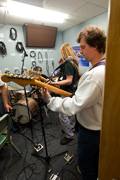 Setting up for a live performance on the Local Music Show at WCBN