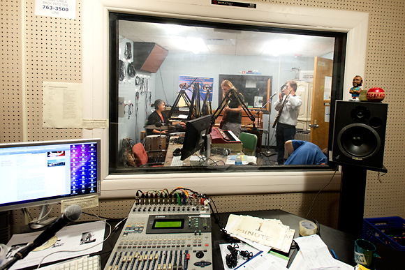 Setting up for a live performance on the Local Music Show at WCBN