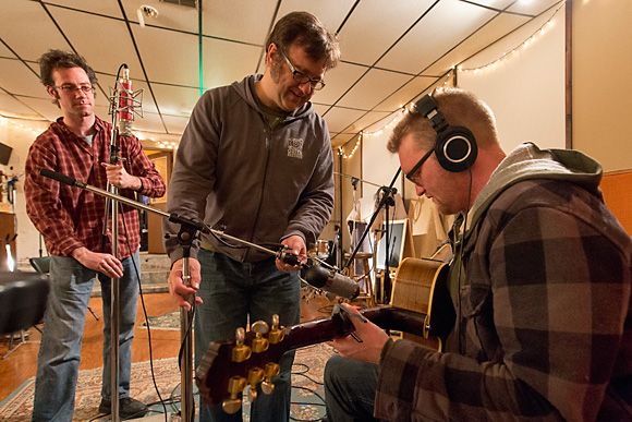 Greg McIntosh and Jim Roll set up mics to record Matt Jones at Backseat Productions