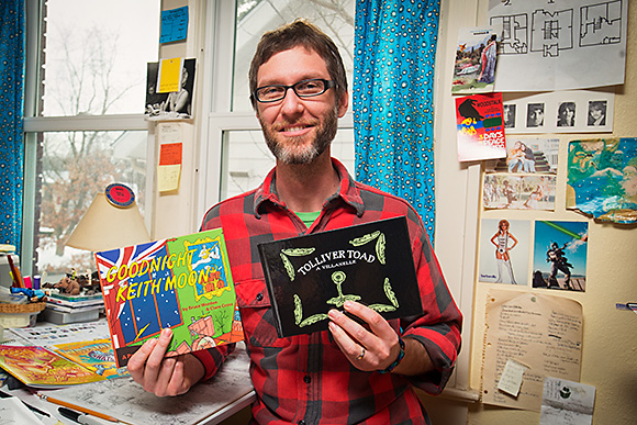 Bruce Worden with his books Goodnight Keith Moon and Tolliver Road