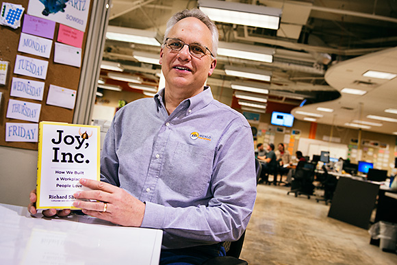 Richard Sheridan with his book Joy, Inc. at Menlo Innovations