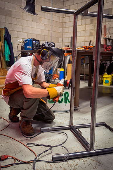 Tom Butler of RoboTodd working at Maker Works