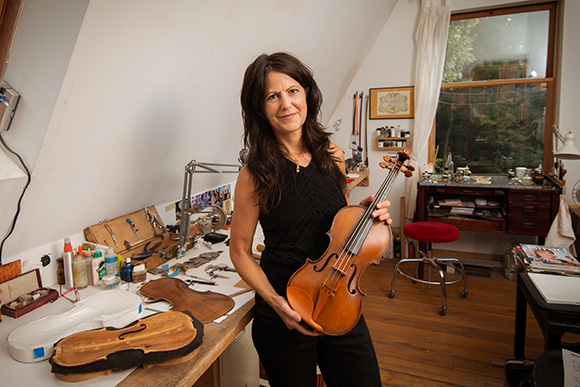 Sharon Que in her violin restoration shop