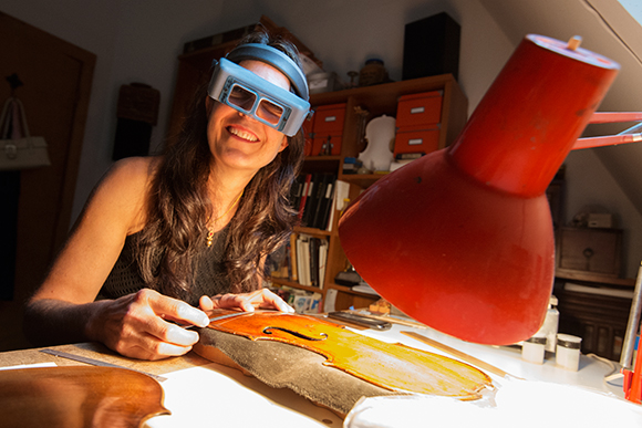 Sharon Que in her violin restoration shop