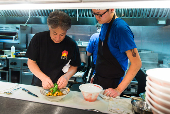 Takashi Yagihashi demonstrating  presentation of a dish