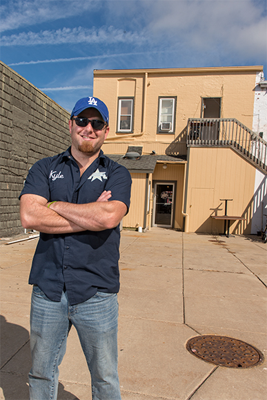 Kyle DeWitt on the future back patio for Tecumseh Brewing Company