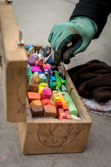 David Zinn working on a chalk drawing