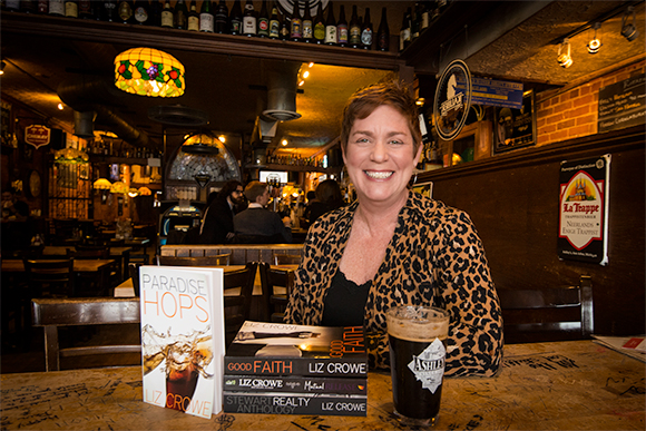 Liz Crowe with some of her novels at Ashley's