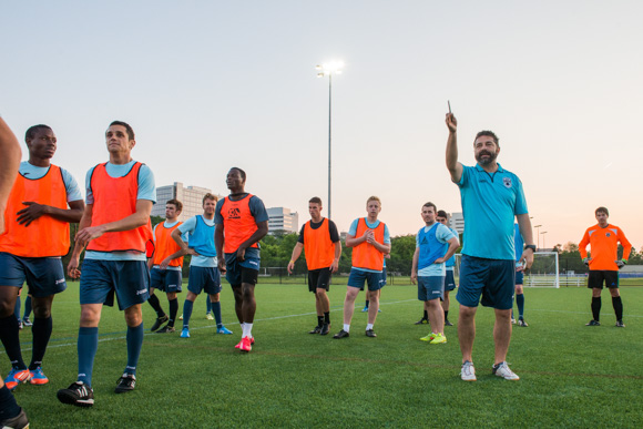 Coach David Hebestreit leading a practice