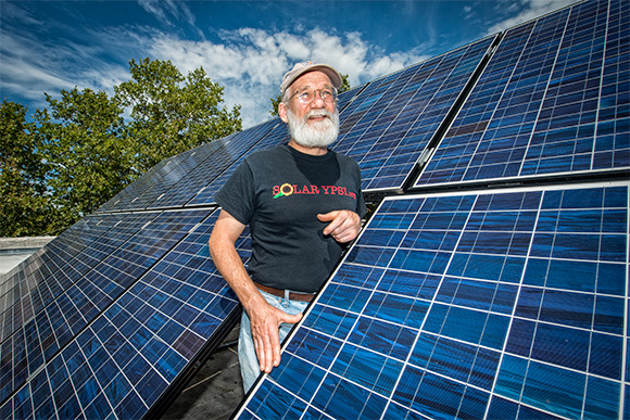 DaveStrenski on the roof of the Ypsilanti Food Coop