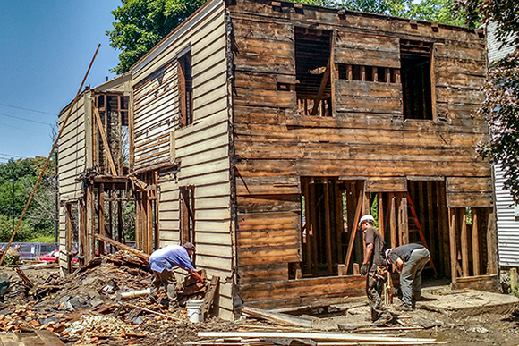 Deconstructing a house on Main Street