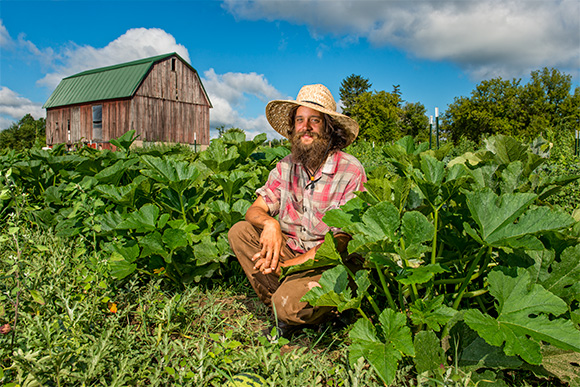 Ryan Padgett with his squash at Tilian Farm