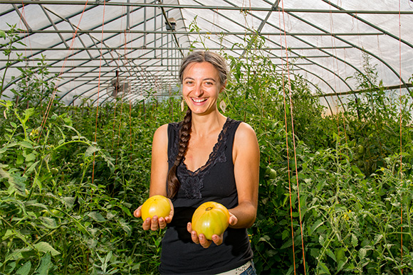 Stefanie Staufer with her heirloom tomatoes at Tilian Farm