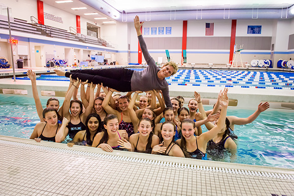 Skyline High School head coach Maureen Isaac with the girls swim team