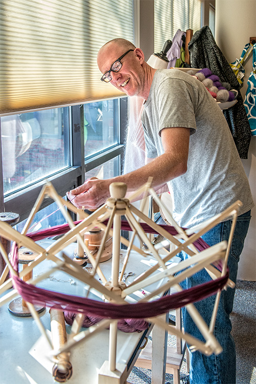 Spun Ann Arbor co-owner and cartoonist Pete Sickman-Garner at the new Kerrytown shop