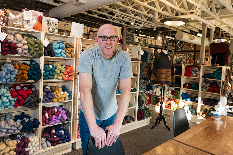 Spun Ann Arbor co-owner and cartoonist Pete Sickman-Garner at the new Kerrytown shop