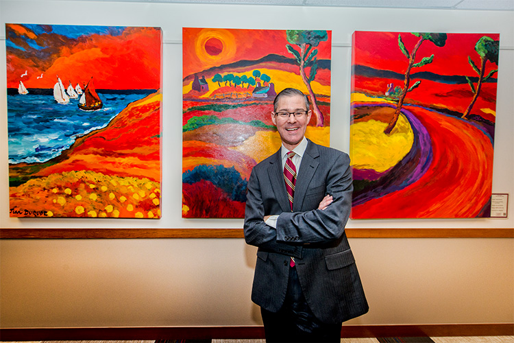 John Petz with some of the extensive collection of the Ave Maria Fine Art Gallery at Domino's Farms