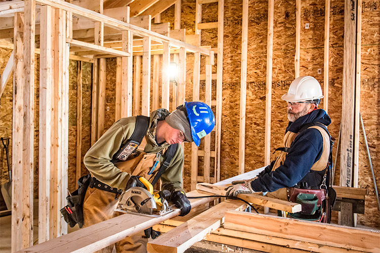 John Birko supervises a student in the AAPS Homebuilding Class