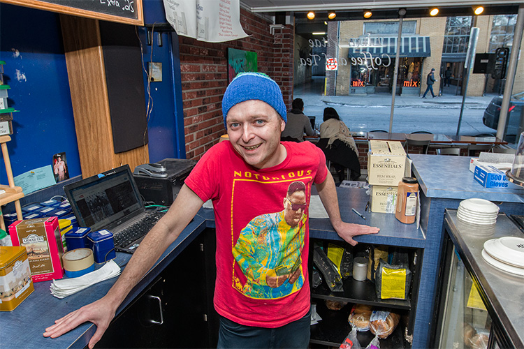 Jimmy Curtis behind the counter at Elixir Vitae on Maynard