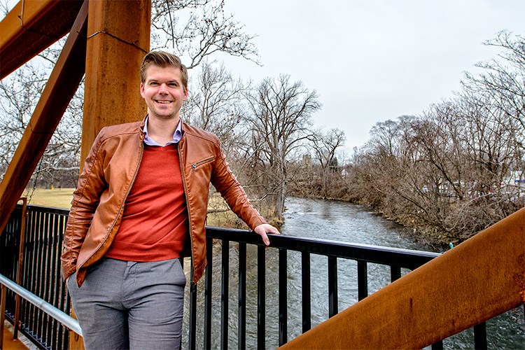 State Representative Adam Zemke by the Huron River in downtown Ypsilanti