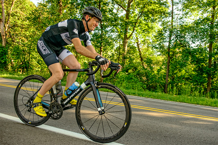 Al McWillians biking on Huron River Drive