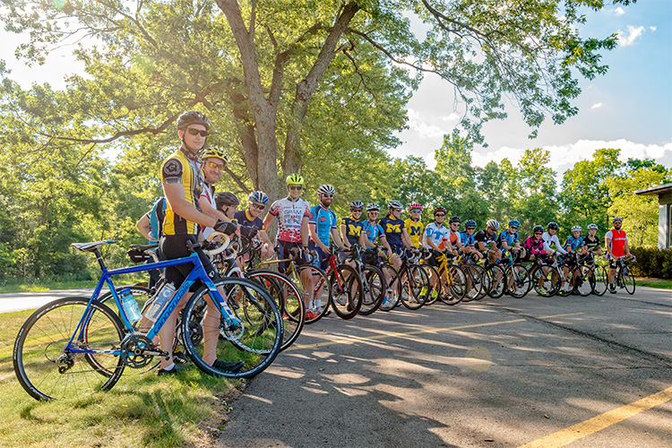 Cyclists turn around on Huron River Drive in Dextre