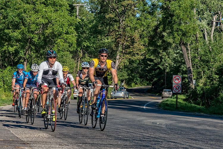 Cyclists on Huron River Drive