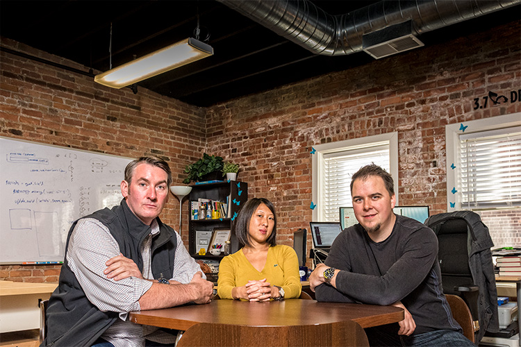 Declan O'Neill, Lyndsay Johnson and Ross Johnson at 3.7 Designs office in Ann Arbor