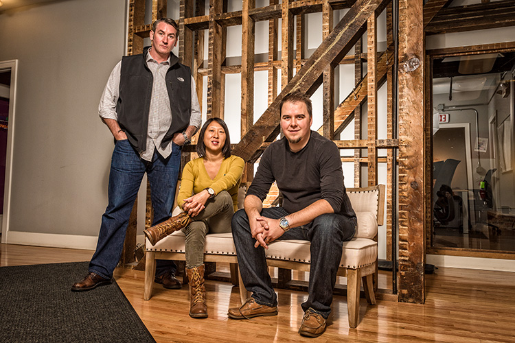 Declan O'Neill, Lyndsay Johnson and Ross Johnson at 3.7 Designs office in Ann Arbor