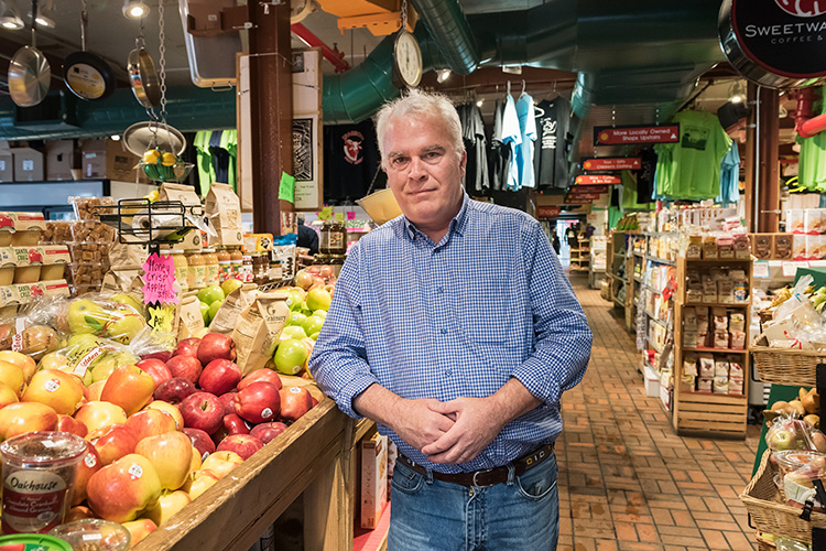 Matt Naud at Kerrytown Market which used PACE financing to upgrade lighting