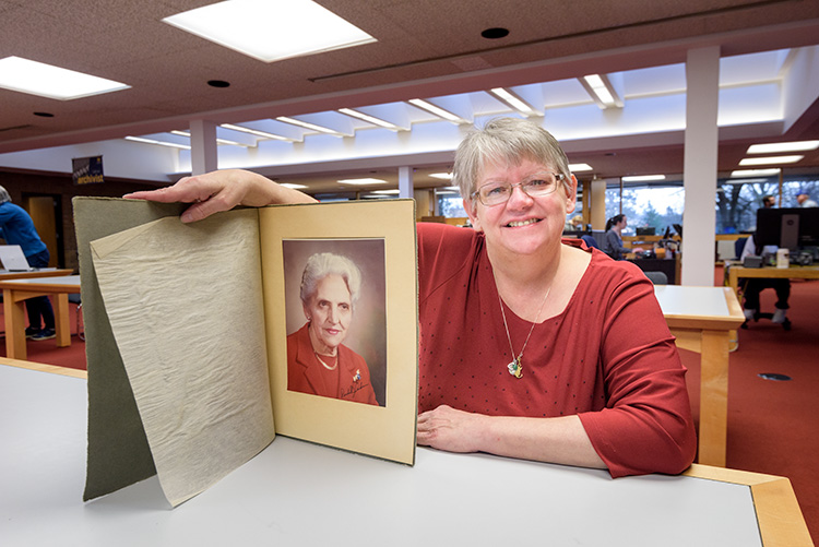 Deb Anderson with a photo of her grandmother and Youth For Understanding Founder Rachel Andresen
