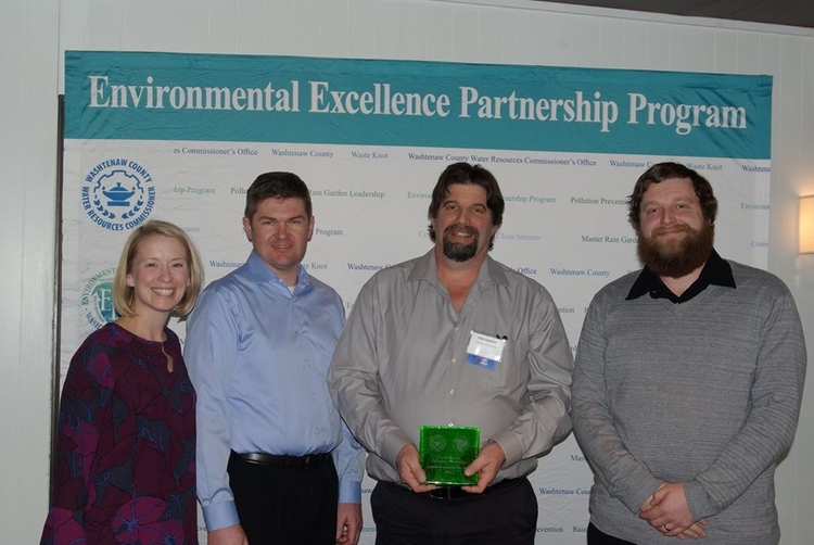 Lambert Industries collects its award for pollution prevention.
