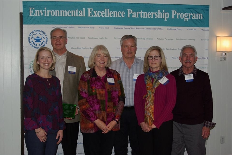 The Saline Environmental Commission collects its award for water quality protection.