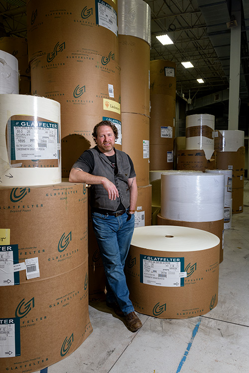 Kevin Spall with the backstock of paper at the Thomson-Shore plant