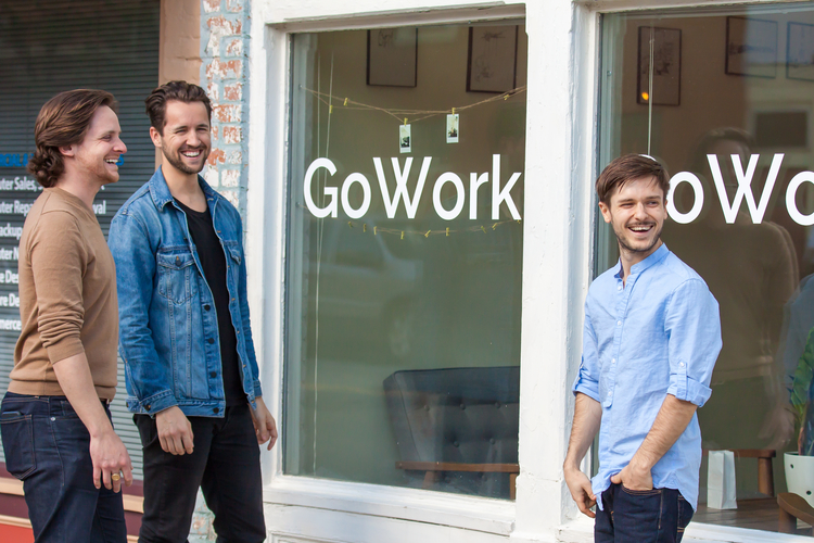 GoWork cofounders Clayton Smith, Kyle Thibaut, and Andrew Sereno stand outside their business.