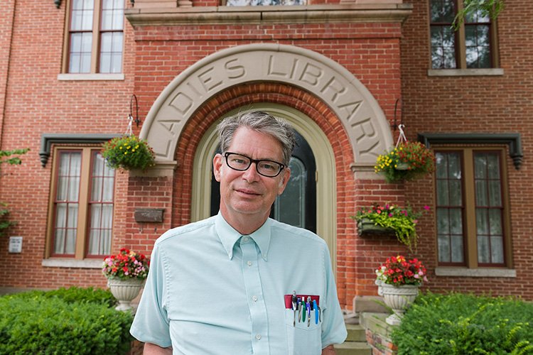 James Mann in front of the Ladies Library on Huron Street