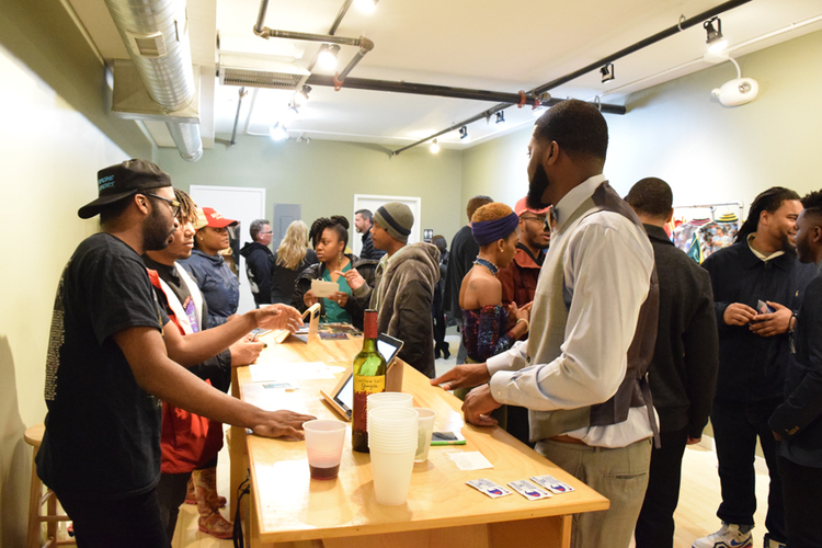 Attendees at the first entrepreneur mixer at Friends Closet on March 30.