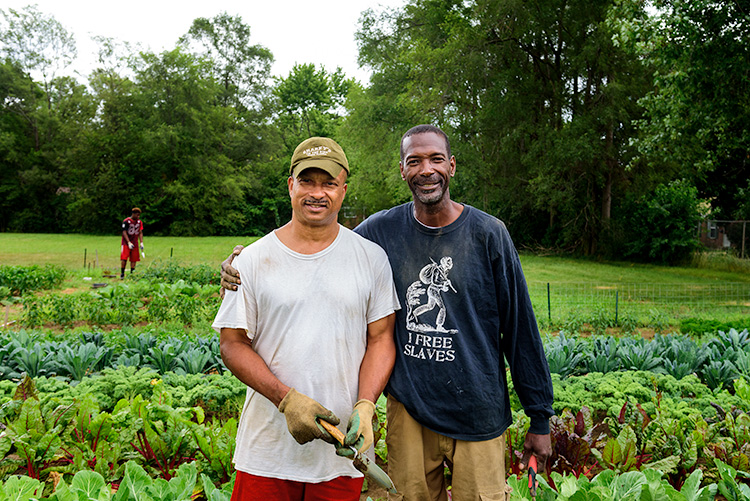 Emanuel Tyus and Melvin Parson at We The People Growers Association gardens