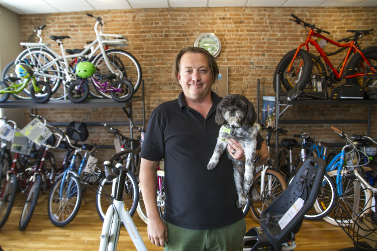 Jim Summers and his dog Zoey at H.E.H. Human Electric Hybrids.