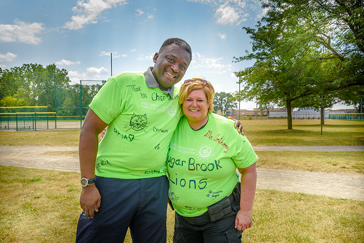 Ypsilanti Township Fire Chief Eric Copeland and Washtenaw County Sheriff Lt. Marlene Radzik at the kickball challenge