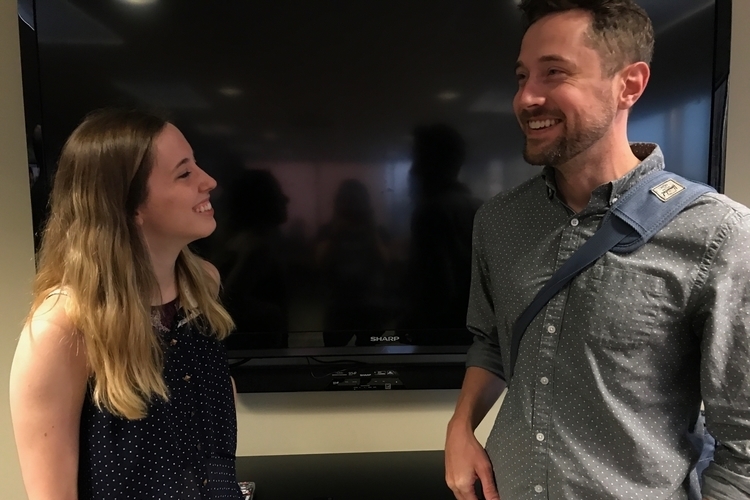 Intern Nicole Raymond talks with Google's Eric Wortman.