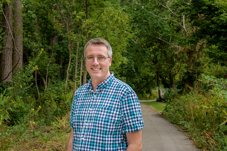 Adam Gainsley at the Water Street Redevelopment Area along the Huron RIver